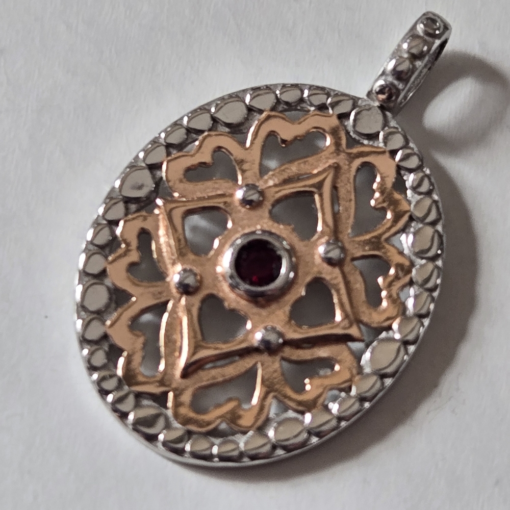Intricate Two-Tone Sterling Silver and Rose Gold Pendant with Gemstone Accent